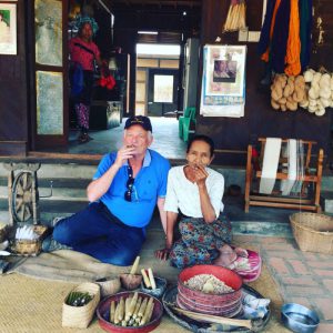 Smoking cheroots with local woman